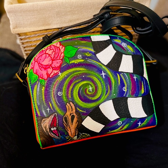 Hand painted cross body purse.